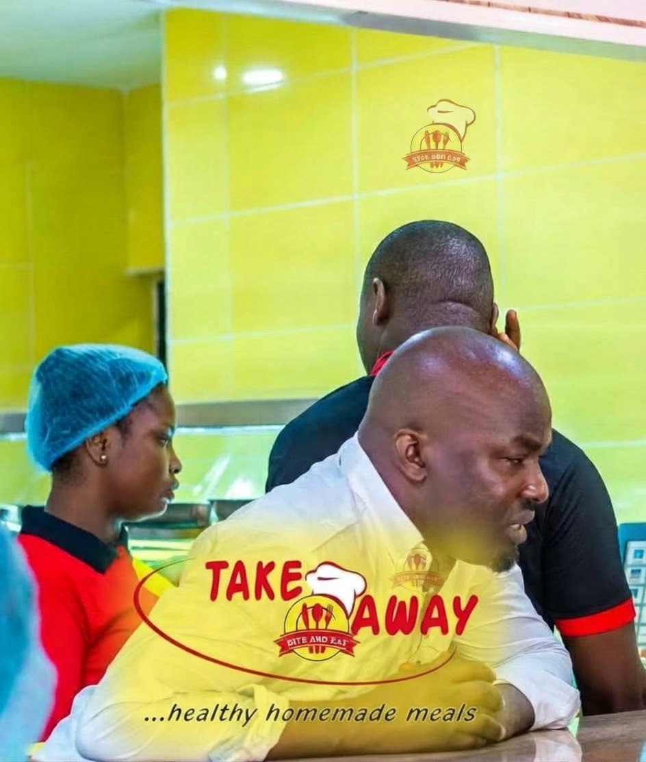 The Take Away Bite and Eat kitchen team preparing fresh homemade meals